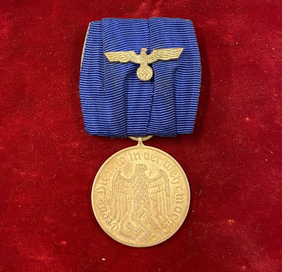 Terzo Reich - Wehrmacht - Medaglia di lungo servizio 4^ Classe per 4 anni di Servizio Leale con con fregio