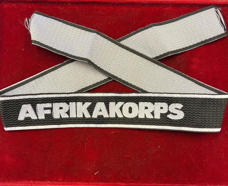 Fascetta da polso AFRIKA KORPS su fondo nero