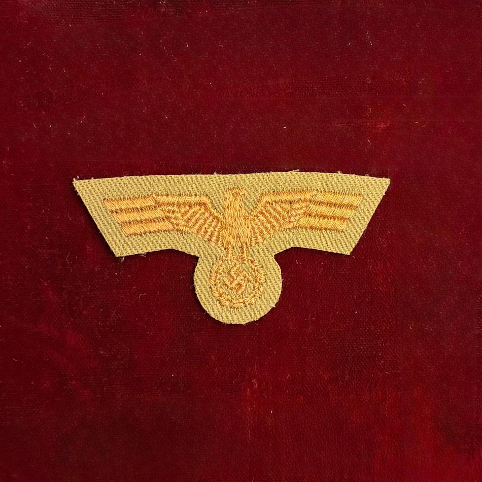 Aquila da bustina dell'Esercito tedesco su fondo kaki/tropicale