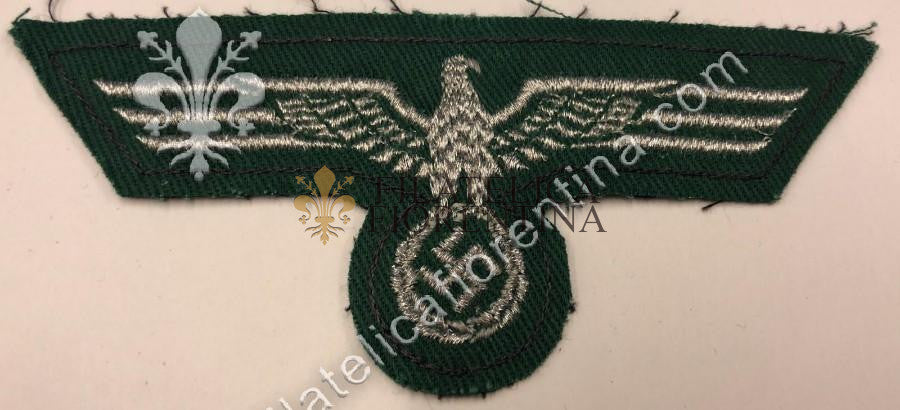 Aquila da ufficiale in filo argentato su fondo verde