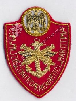 Distintivo del Com. Milizie Contaeree - Reparti CL. Maritima - Mod. in canottiglia