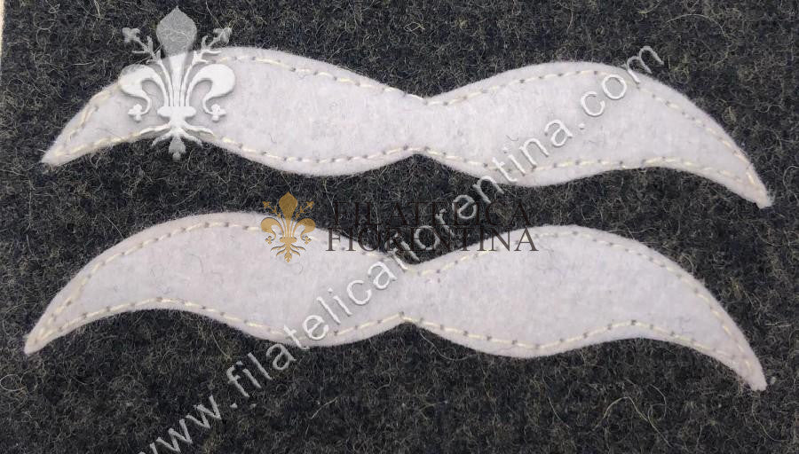 Grado da Unterfeldwebel - bianco su fondo grigio-blu