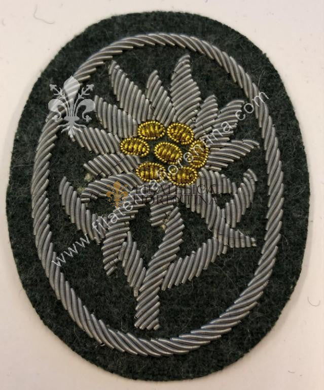 Stella Alpina da Ufficiale SS ( Edelweiss ) fondo verde, in canottiglia