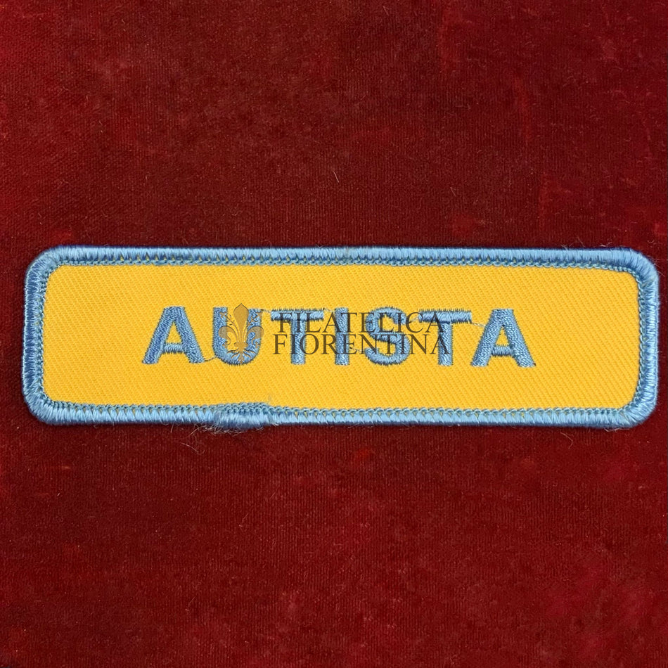 Patch con la scritta AUTISTA