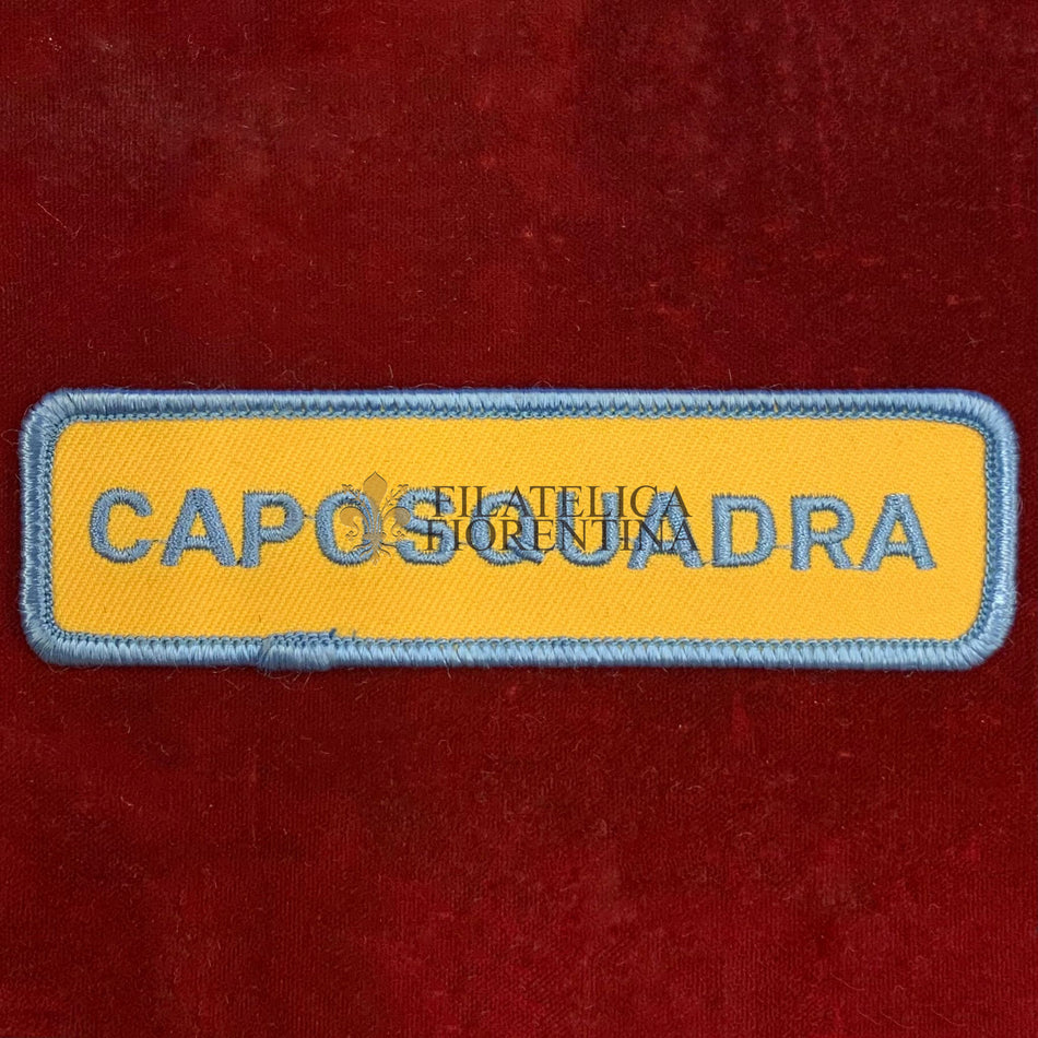 Patch con la scritta CAPOSQUADRA