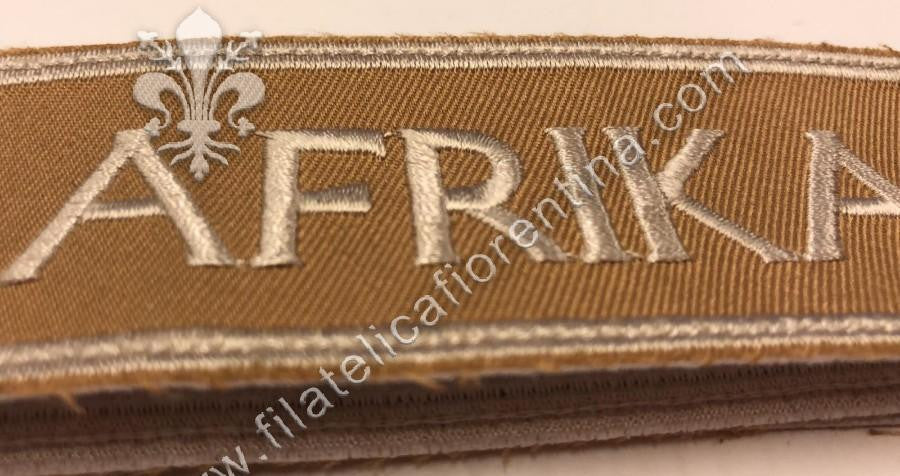 Fascetta da polso per truppa con scritta "AFRIKA" - ricamata in filo bianco