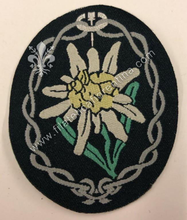 Edelweiss da braccio truppe Alpine "Gebirgsjager" - fondo verde